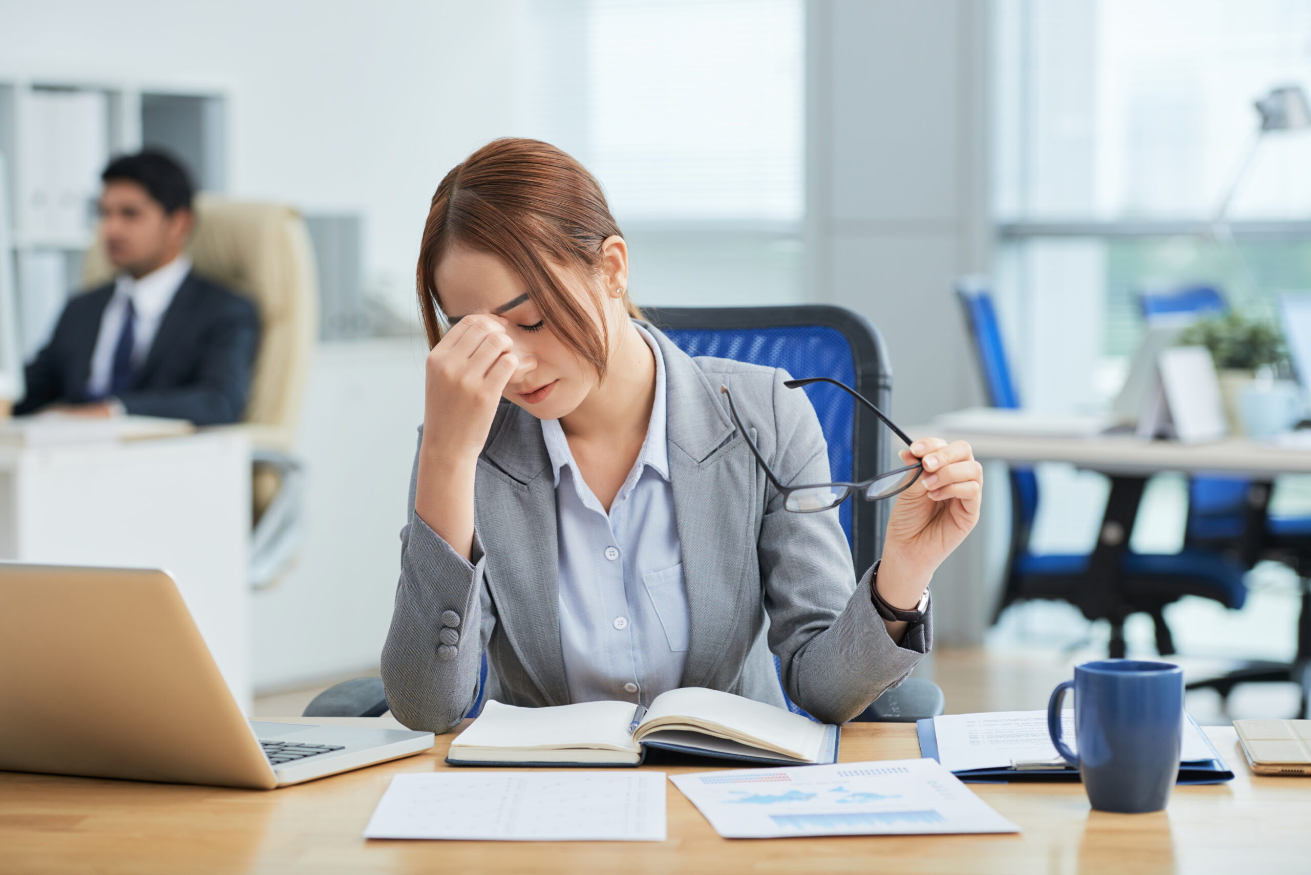 medium shot young asian woman sitting desk office rubbing nose 2 scaled - Sản phẩm được bán bởi Gimedi Pharma